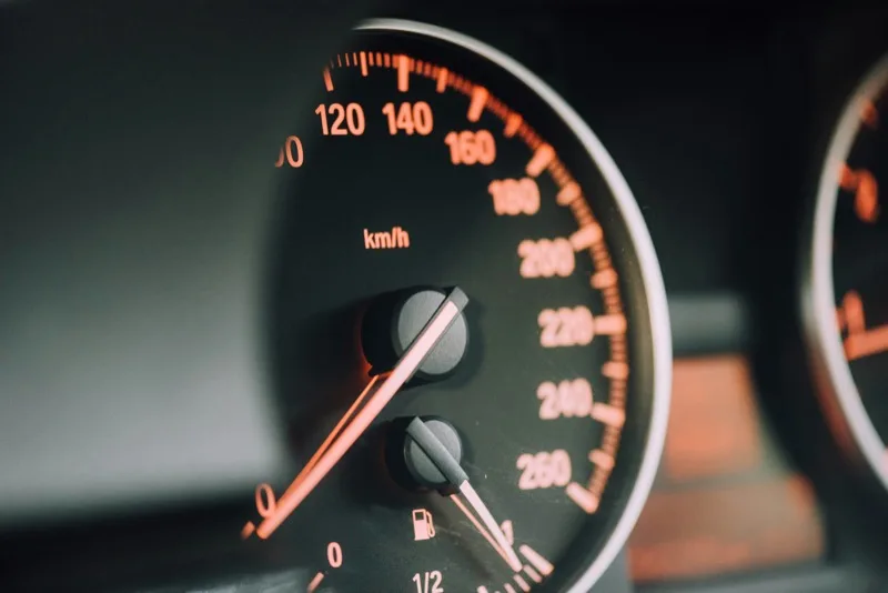 Close-up of a car speedometer dial